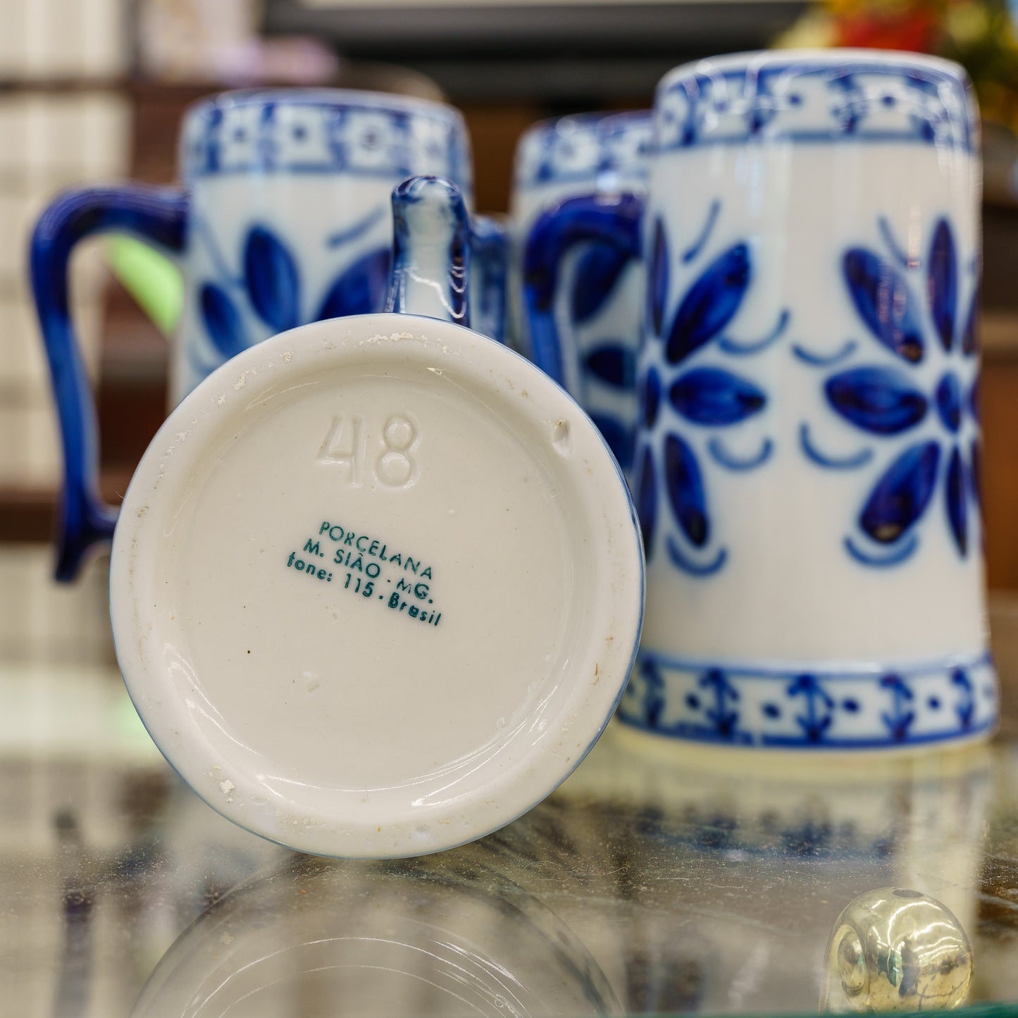 Set of 4 Monte Siao Porcelain Beer Steins