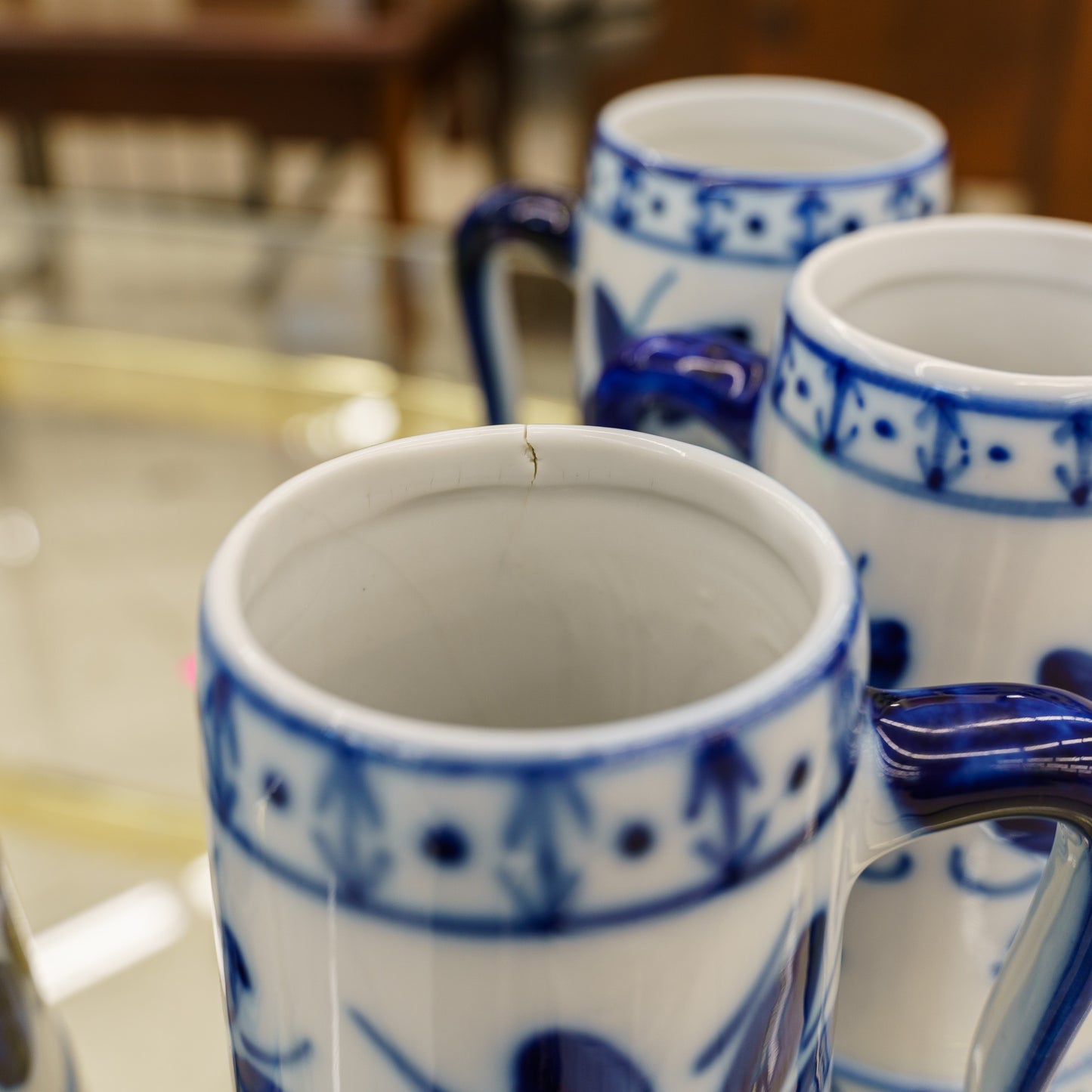 Set of 4 Monte Siao Porcelain Beer Steins