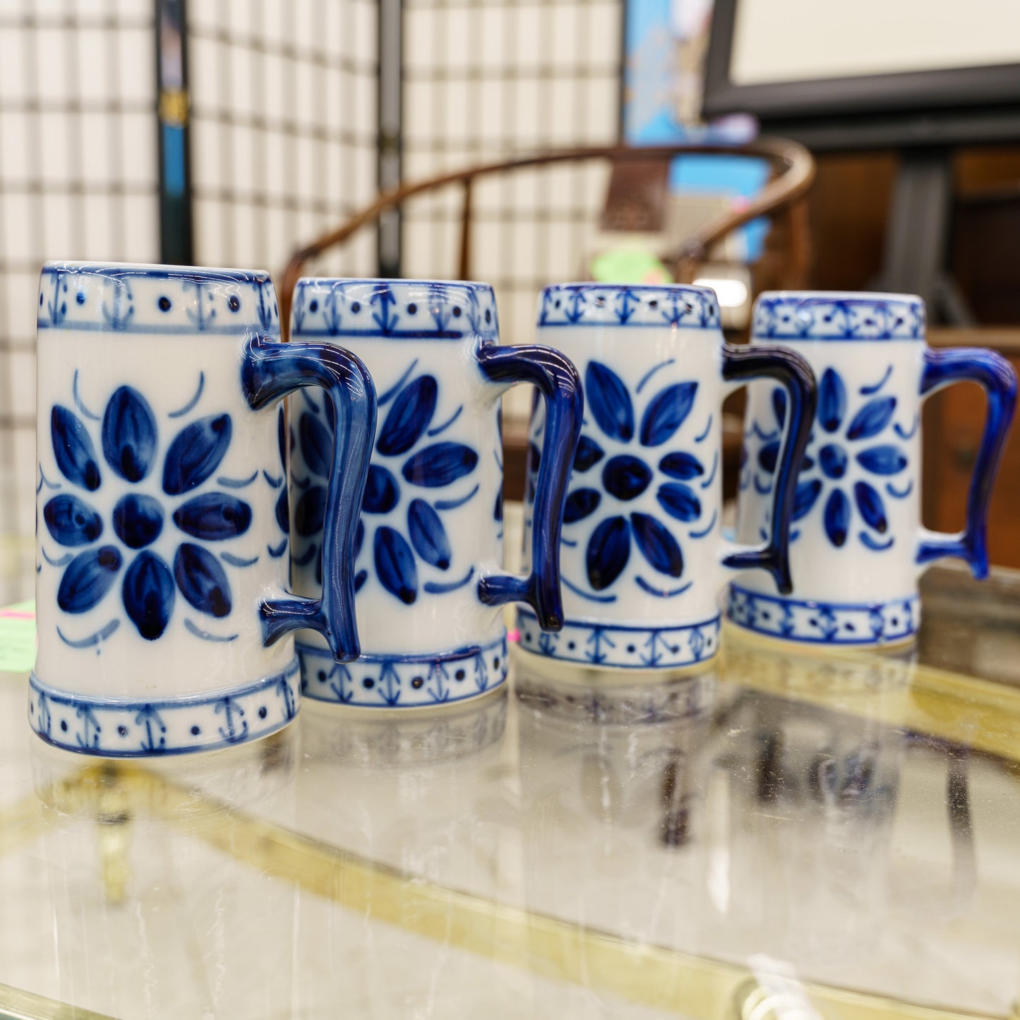 Set of 4 Monte Siao Porcelain Beer Steins