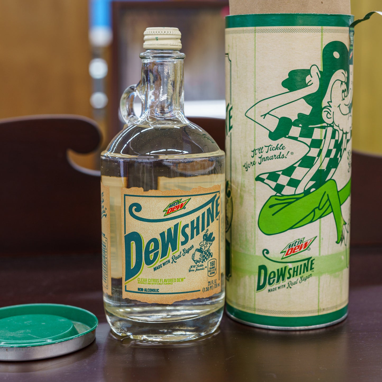 Limited Edition Mtn DEWshine 25 Fluid Ounce Collectible jug and canister