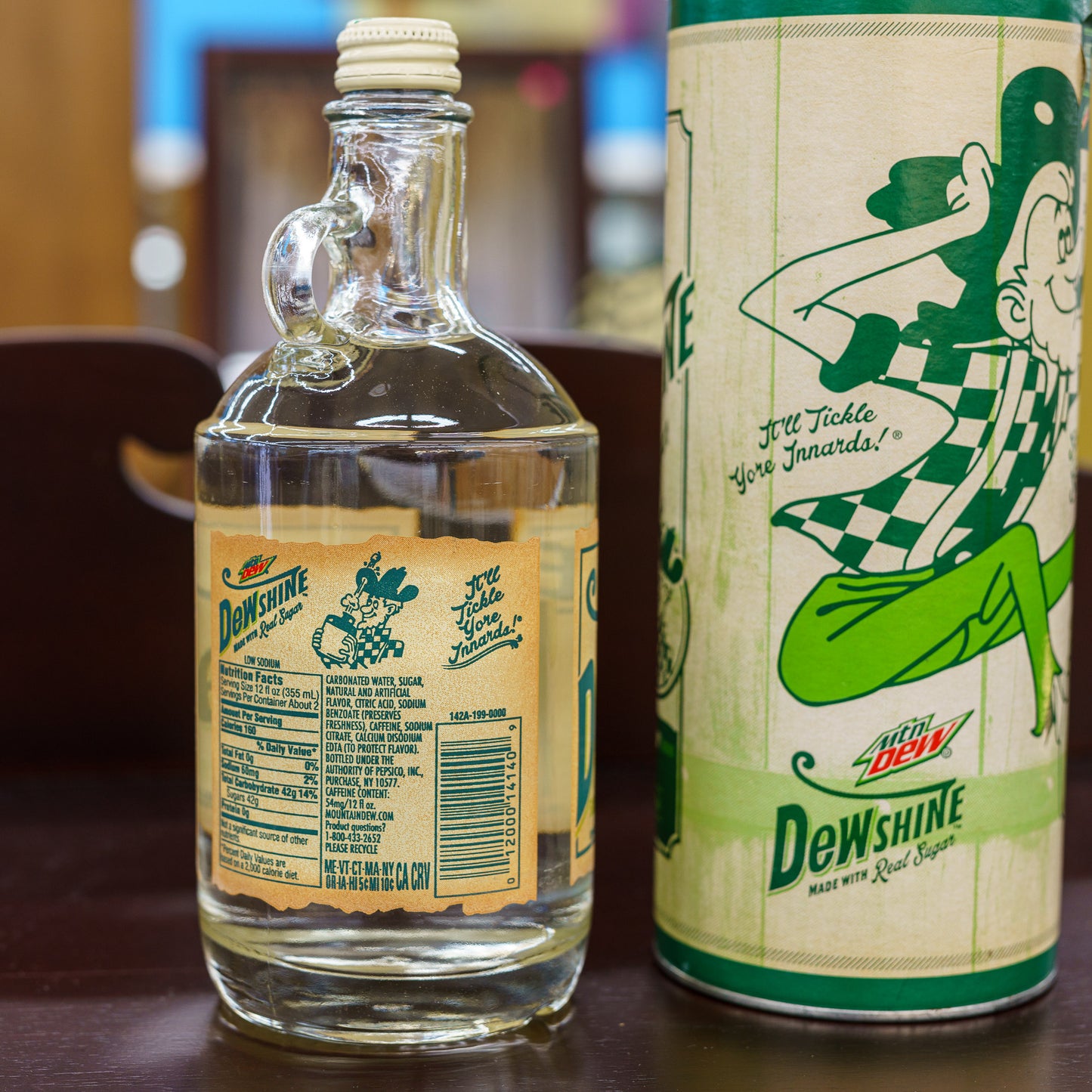 Limited Edition Mtn DEWshine 25 Fluid Ounce Collectible jug and canister