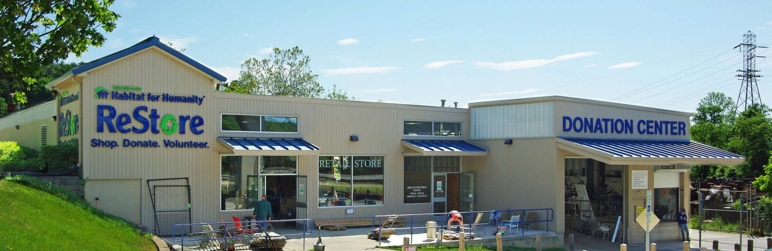 The front entrances and donation drop off lane at the Asheville ReStore.